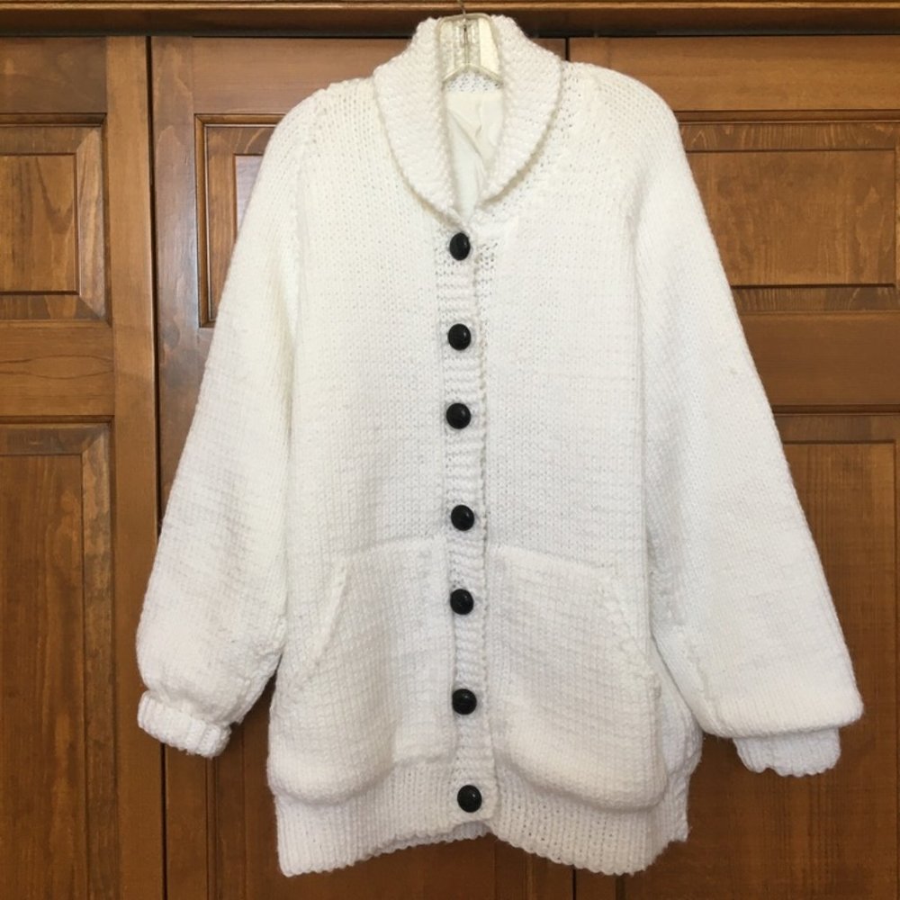 Sweater/Jacket with Curler on back.